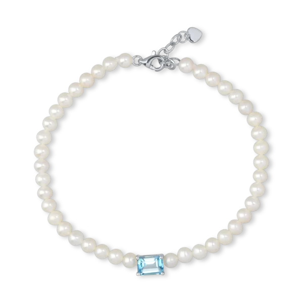Bratara din aur alb cu perle de cultura de 22.8ct si topaz albastru octogonal de 1.2ct