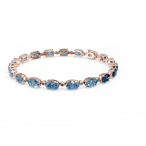 Bratara tennis din aur roz cu topaze london blue ovale de 18.4ct