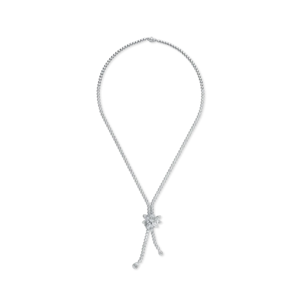 Colier cu floare din aur alb cu diamante baguette si rotunde de 5.3ct