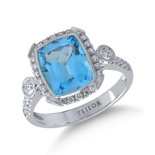 Inel din aur alb cu topaz albastru cushion de 4ct si diamante de 0.3ct